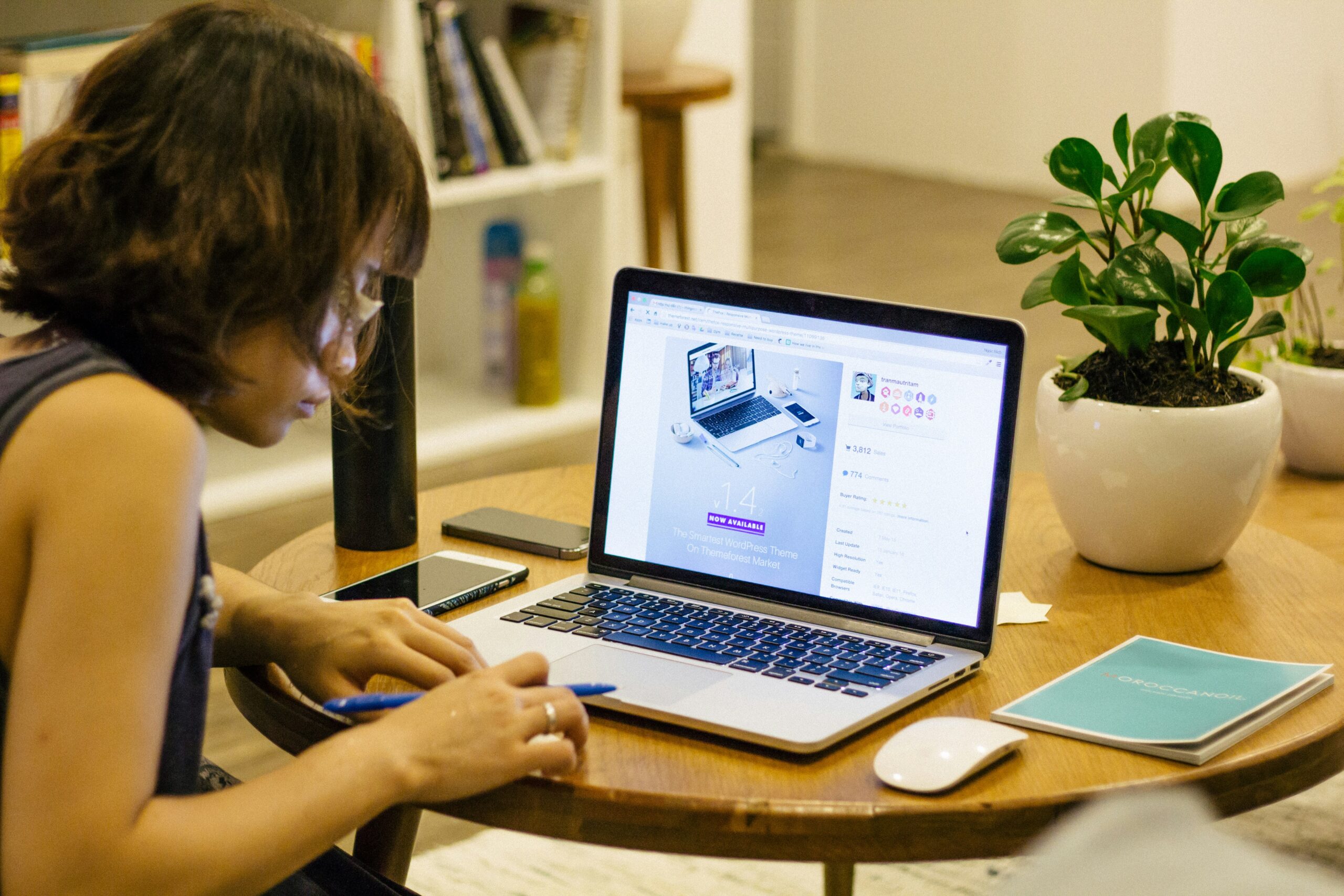 Person designing website on laptop